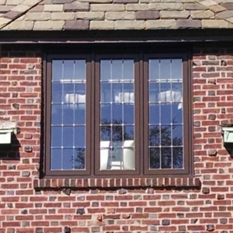 close up of window on brick building in brooklyn